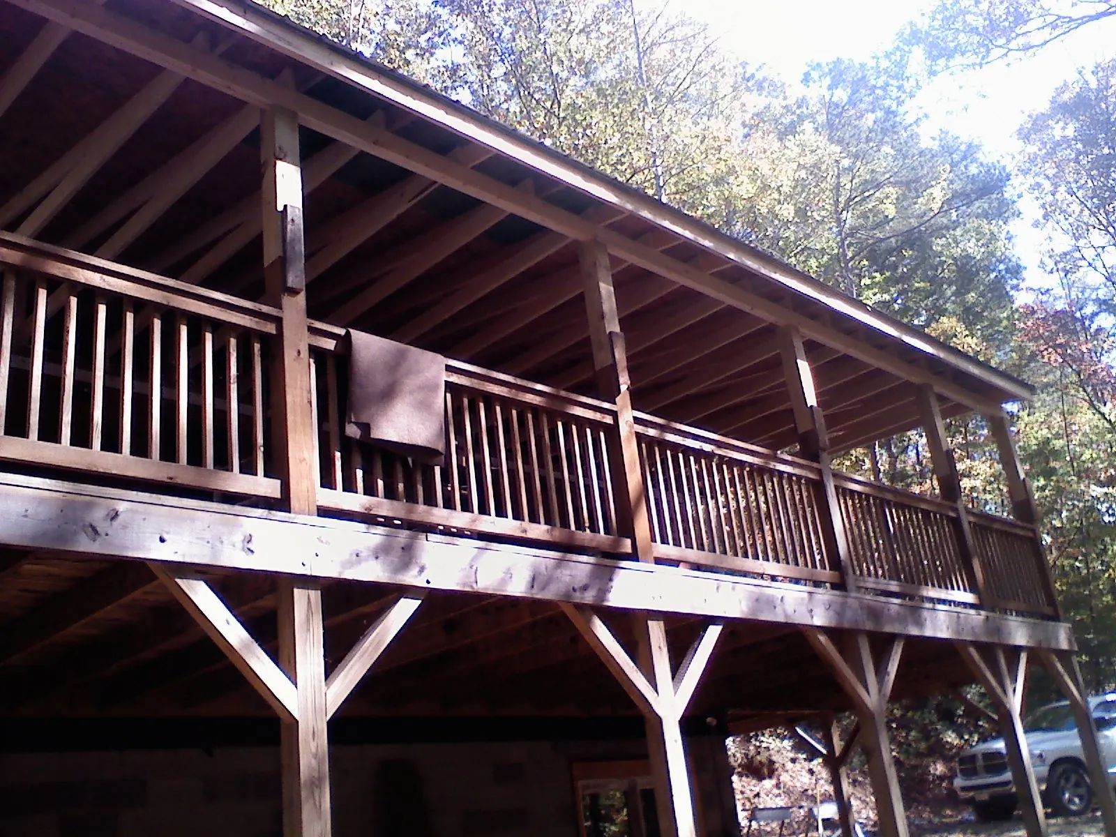 Timber framing under a new elevated porch and deck — Roof Leak Repair in Nicollet by Roofing Brothers